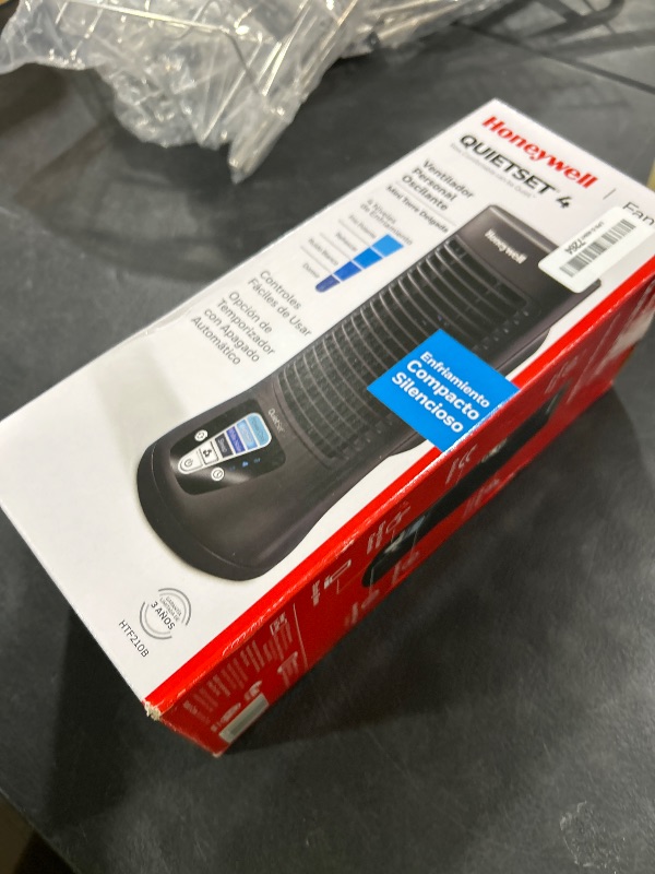 Photo 1 of Honeywell QuietSet Personal Table Fan, Oscillating Personal Desk Fan with Quiet Operation, 4 Levels of Power and Sound, Black, HTF210B
