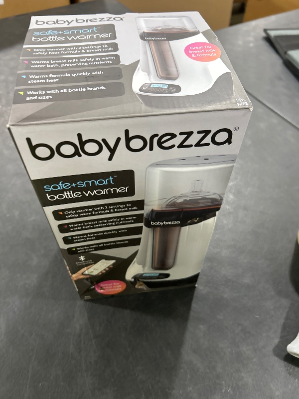 Photo 1 of Baby Brezza Smart Baby Bottle Warmer, Breastmilk Warmer + Defroster – Free App - Only Brand with Different Temperatures for Breastmilk + Formula - Universal Fit for All Bottles + Milk Bags