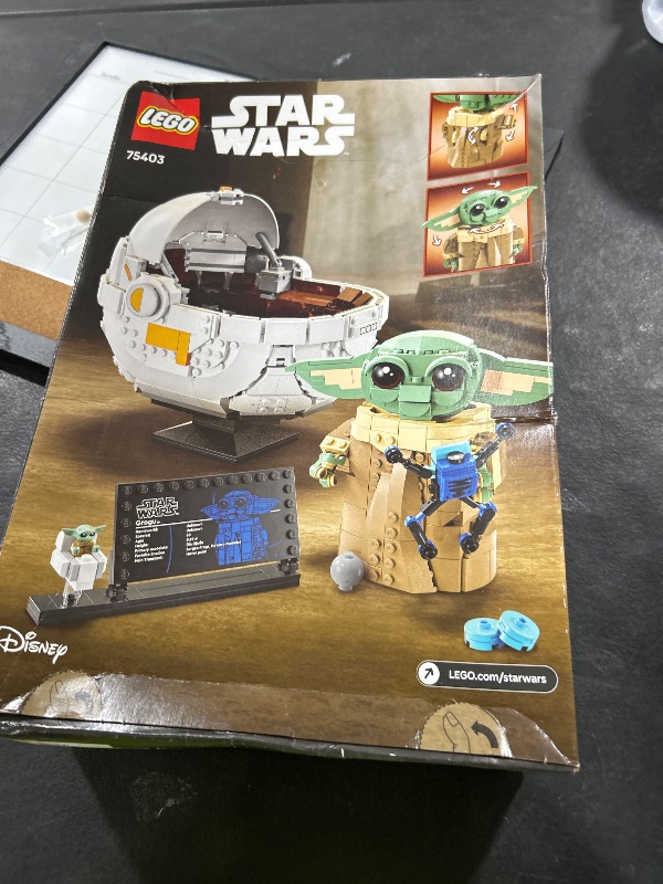 Photo 1 of LEGO Star Wars: The Mandalorian Grogu with Hover Pram Building Toy Set - Star Wars Toy for Kids, Boys and Girls, Ages 10+ - Gift Idea for Birthday - 75403