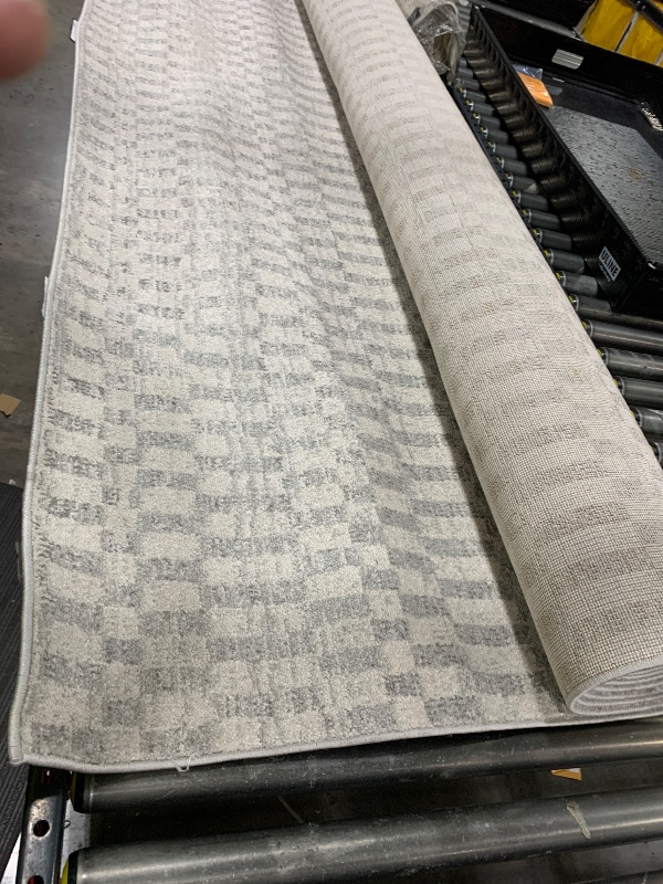 Photo 1 of large square rug
size unknown