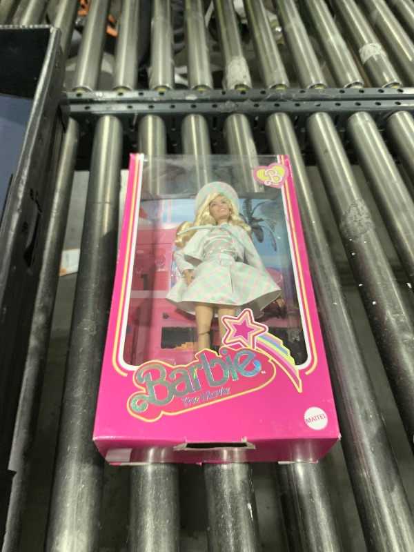 Photo 1 of Barbie The Movie Doll, Margot Robbie as, Collectible Doll Wearing Blue Plaid Matching Set with Matching Hat & Jacket