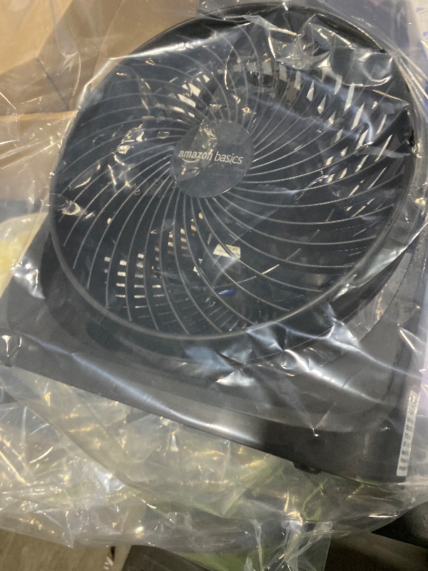Photo 1 of Amazon Basics Air Circulator Fan, Desk Fan for Bedroom, Home and Office, With 90-Degree Tilt Head, 3 Speed Settings, Lightweight (3 LBS), 35 Watts, Black, 11.1"W x 6.3"D x 10.9"H
