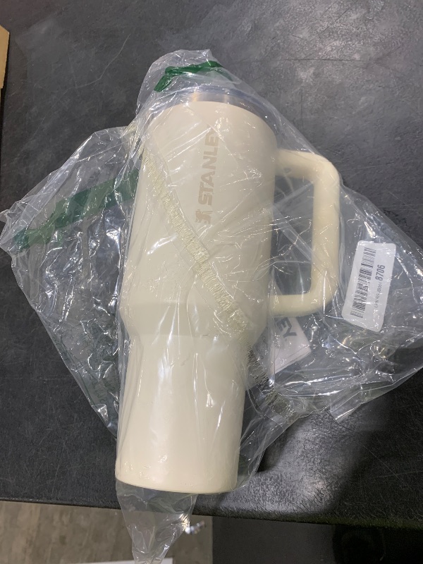 Photo 1 of Stanley Quencher ProTour Flip Straw Tumbler with Leakproof Lid 40 oz | Built-In Straw & Handle | Cupholder Compatible for Travel | Insulated Stainless Steel Cup | BPA-Free | Cream