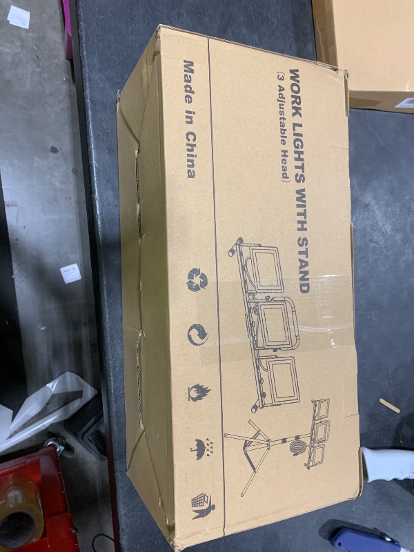 Photo 1 of 21000 Lumen Work Lights with Stand, 3 Adjustable Head LED Work Light, with Adjustable and Foldable Tripod Stand, Waterproof Lamp with Individual Switch with 6500 Kelvin Color Temperature