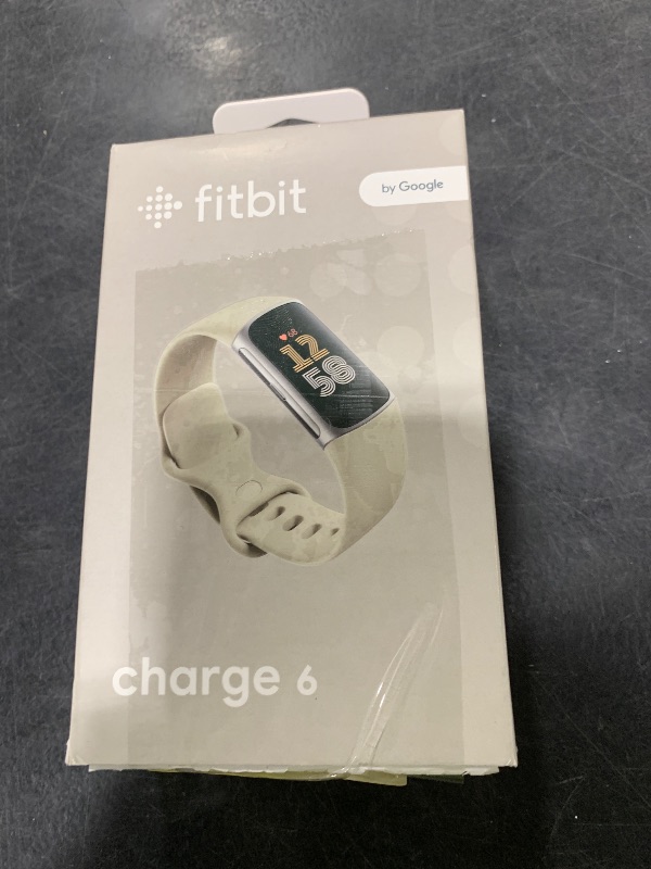 Photo 1 of Fitbit Charge 6 Fitness Tracker with Google apps, Heart Rate on Exercise Equipment, 6-Months Premium Membership Included, GPS, Health Tools and More, Porcelain/Silver, One Size (S & L Bands Included)