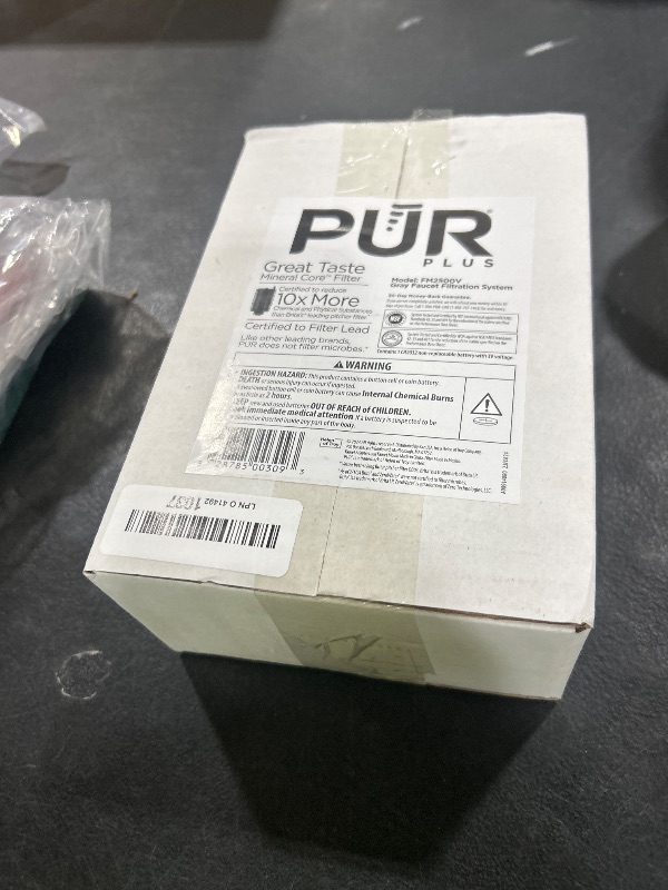 Photo 1 of PUR Plus Vertical Faucet Mount Water Filtration System, Lead-Reducing Water Filter For Sink Faucet, Easy Install, 100 Gallons, Compatible with Sinks with External Aerators, Grey