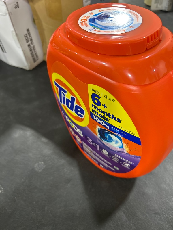 Photo 1 of Tide PODS Laundry Detergent Pacs, 3-in-1 Stain Remover, Odor Fighter, Color Protector, 112 Count, HE compatible, Spring Meadow Scent