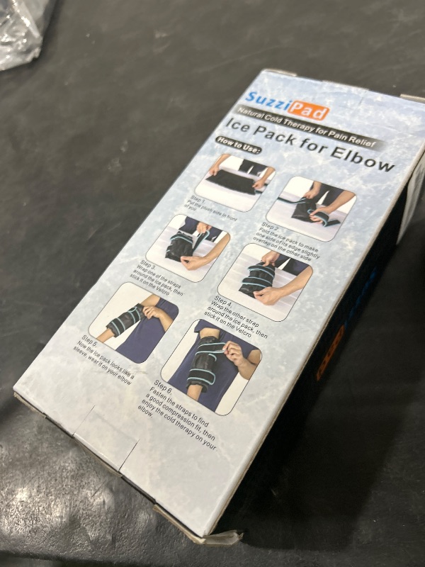 Photo 1 of SuzziPad Elbow Ice Pack Wrap – Wearable Cold Compression Sleeve for Elbow & Forearm, Reusable Ice Pack for Tennis & Golf Recovery, Black