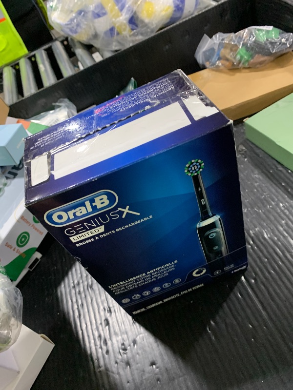 Photo 1 of Oral-B Genius X Limited Rechargeable Electric Toothbrush with 1 Replacement Brush Head, Travel Case, Midnight Black