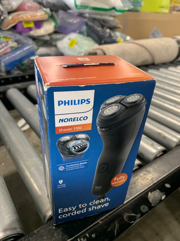 Photo 1 of Philips Norelco Shaver 1100 Series, Dry Electric Shaver, 27 Self-Sharpening ComfortCut Blades, 4D Floating Heads, P-Cap, Deep Black, Model S1016/90