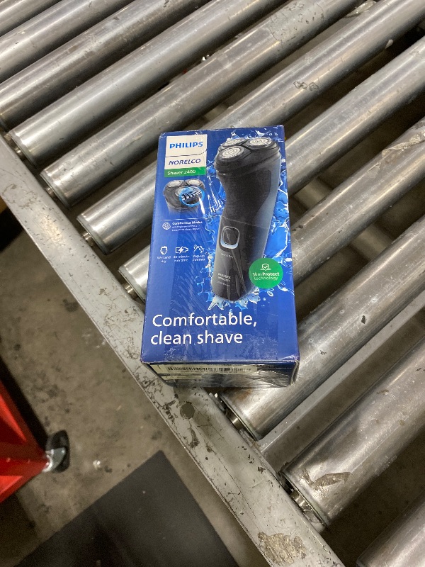 Photo 1 of Philips Norelco Shaver 2400 Series, Wet and Dry Electric Shaver, Pop-up Trimmer, P-Cap, Deep Black, Model X3001/90