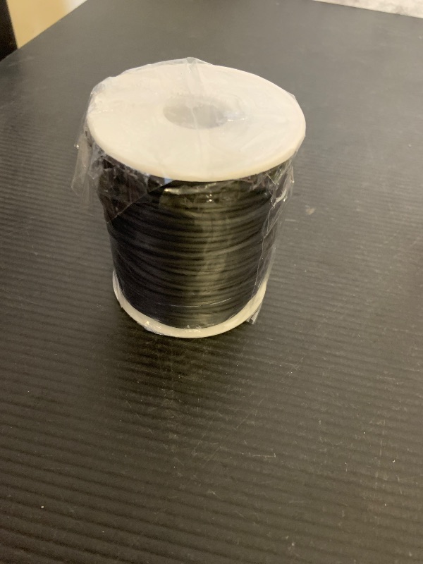 Photo 1 of Pandahall 54.68 Yards/Roll 2mm Hollow Pipe Tubuing Rubber Cord with 1mm Hole Solid Rubber Tube Cord with Plasic Spool (Black)