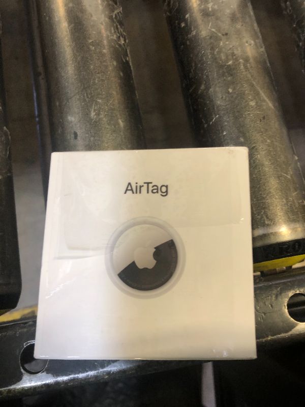 Photo 1 of Apple AirTag. Keep Track of and find Your Keys, Wallet, Luggage, Backpack, and More. Simple one-tap Set up with iPhone or iPad