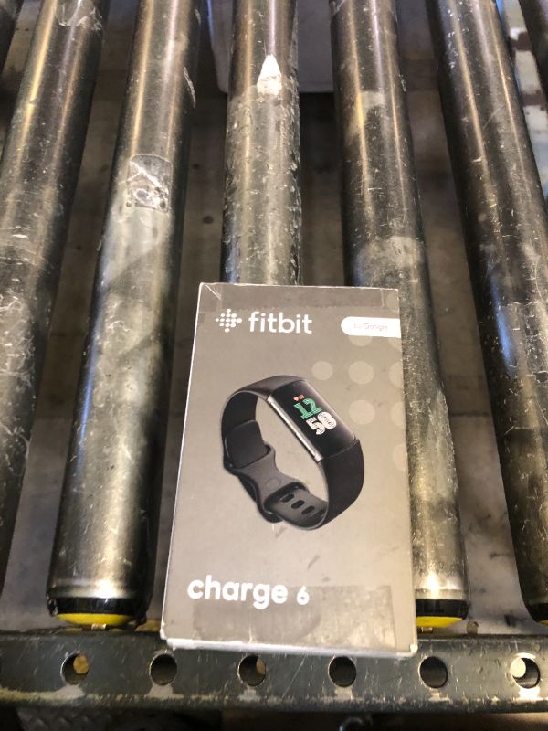 Photo 1 of Fitbit Charge 6 Fitness Tracker with Google apps, Heart Rate on Exercise Equipment, 6-Months Premium Membership Included, GPS, Health Tools and More, Obsidian/Black, One Size (S & L Bands Included)
