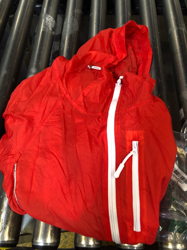 Photo 1 of Red Orange Wind Breaker
Size: Small
