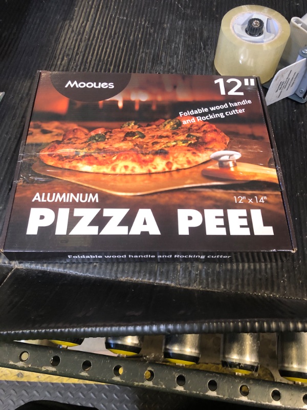Photo 1 of Pizza Peel Aluminum Pizza Spatula, Mooues 12 inch Metal Pizza Paddle(12"x 14")with Rocker Cutter Foldable Wood Handle, [Storage bag included], for Family Pizza Oven Baking Pizza, Dough, Bread & Pastry