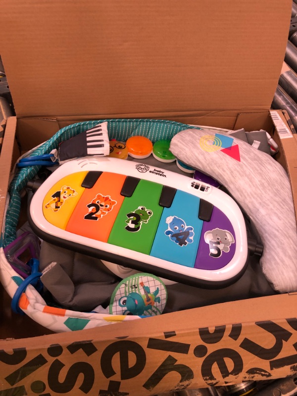 Photo 1 of Baby Einstein 4-in-1 Kickin' Tunes Music and Language Play Gym and Piano Tummy Time Activity Mat
