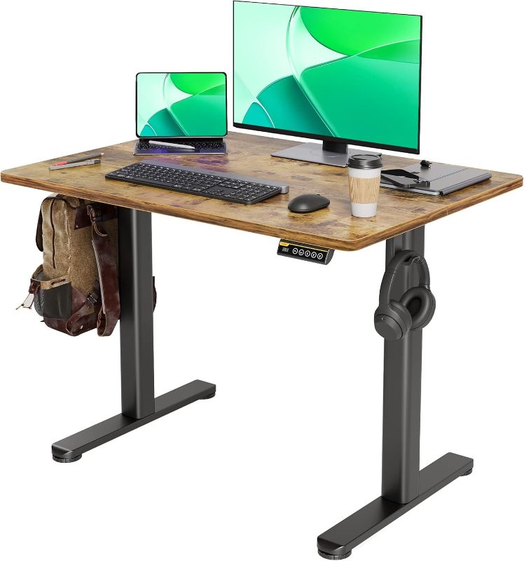 Photo 1 of Claiks Electric Standing Desk, Adjustable Height Stand up Desk, 40x24 Inches Sit Stand Home Office Desk with Splice Board, Black Frame/Rustic Brown Top

