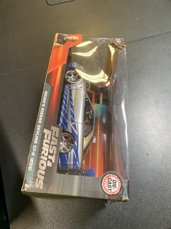 Photo 1 of Jada Toys Fast & Furious Brian’s 2002 Nissan Skyline R34 Die-cast Car, 1:24 Scale, Silver & Blue,19808