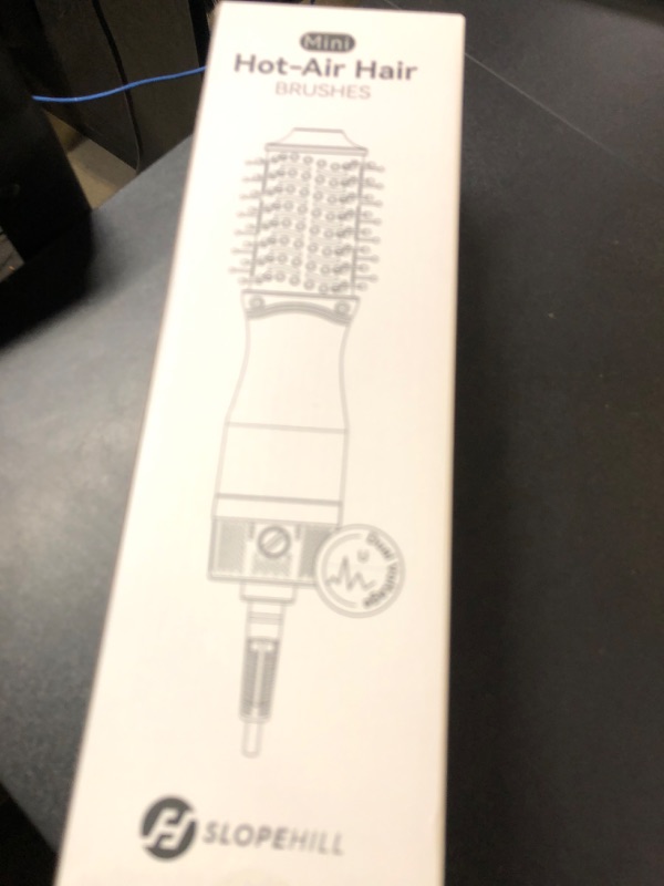 Photo 1 of slopehill Mini Dual Voltage Hair Dryer Brush,1000 Watts Travel Hot Air Brush with European Plug, Ionic One Step Hair Dryer and Styler for Women for Home & Salon, Oval Barrel 2 Heat & 2 Speed Settings