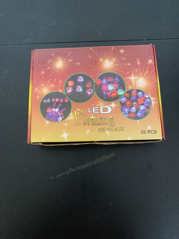Photo 1 of Coluans Halloween Treats 25Pcs Halloween Party Favors for Kids Adults LED Ring Halloween Accessories Light Up Rings Halloween Toys Flash Rings Non Candy Gift Bag Fillers New Version