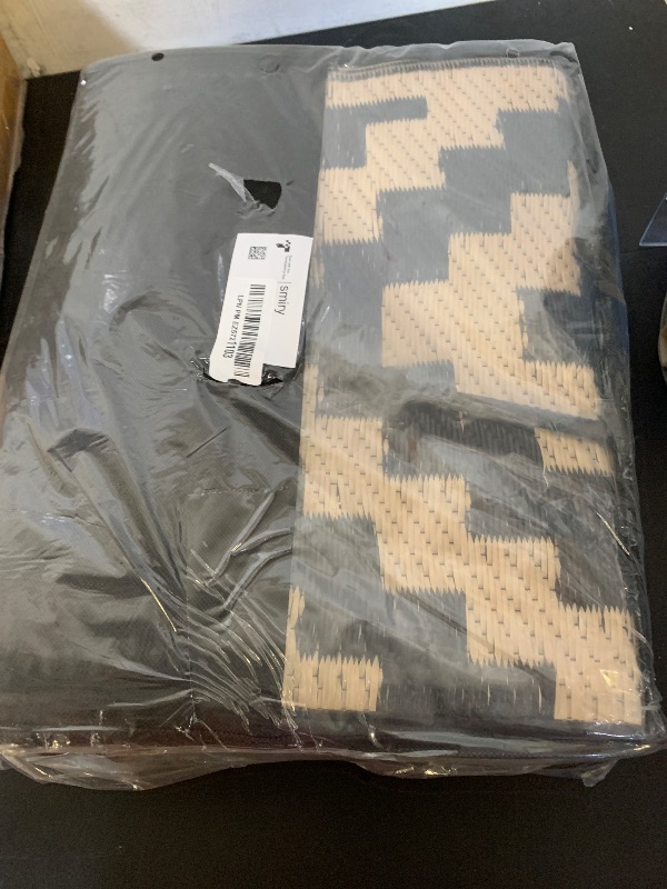 Photo 1 of Smiry Waterproof Outdoor Rug 5x8 ft, Reversible Plastic Straw Patio Camping Rugs, Outdoor Indoor RV Mat Carpet for Patio, Outside Entry, Backyard, Deck, Bench, Picnic, Camper, Black & Beige
