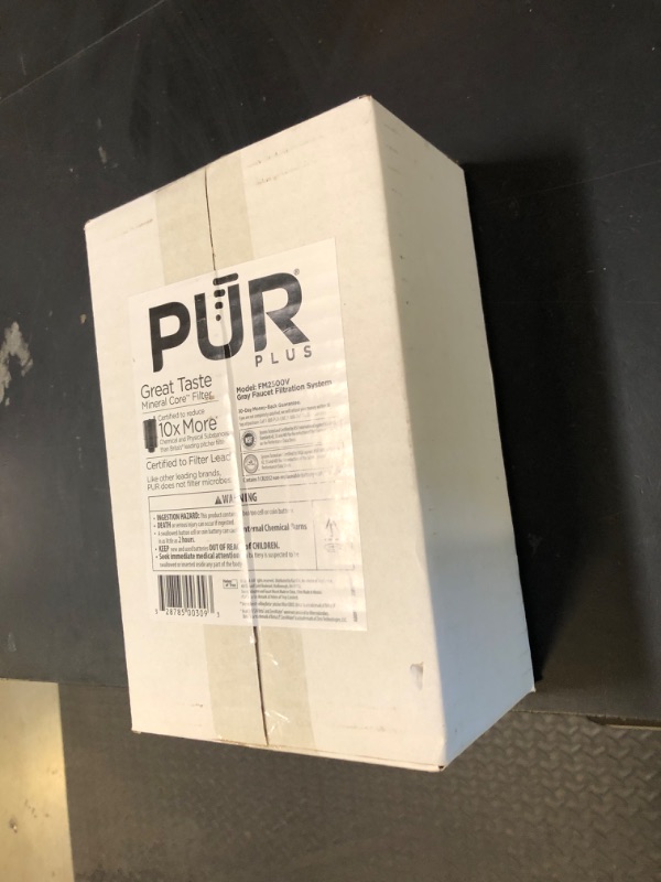 Photo 1 of PUR Plus Vertical Faucet Mount Water Filtration System, Lead-Reducing Water Filter For Sink Faucet, Easy Install, 100 Gallons, Compatible with Sinks with External Aerators, Grey