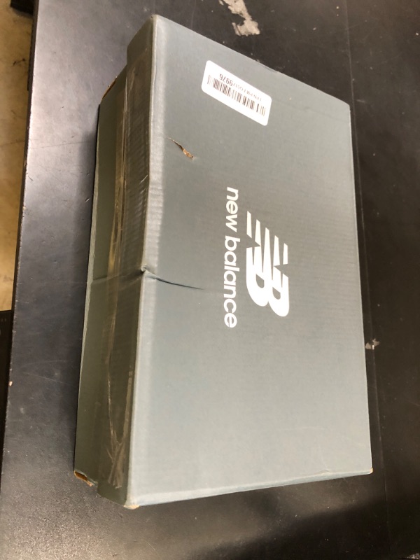 Photo 1 of New Balance Women's 574 Core Sneaker, Nimbus Cloud/White, 8