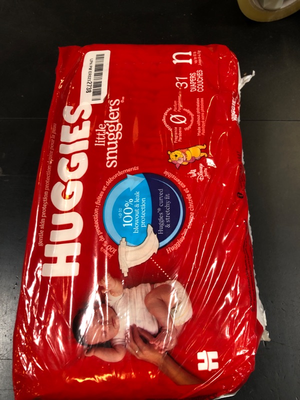 Photo 1 of Huggies Size Newborn Diapers, Little Snugglers Baby Diapers, Size Newborn (up to 10 lbs), 31 Count, Packaging May Vary