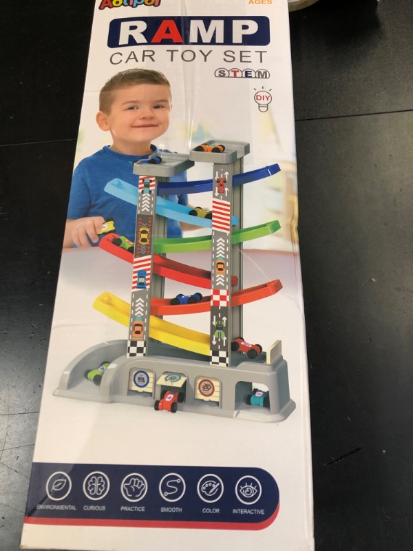 Photo 1 of Montessori Toys for 2 3 Year Old Boys Toddlers, Car Ramp Toys with 6 Cars & Race Tracks, Garages and Parking Lots, Ramp Racer Toy Gift for Boys Girls Age 18 Months and Up, Multicolor