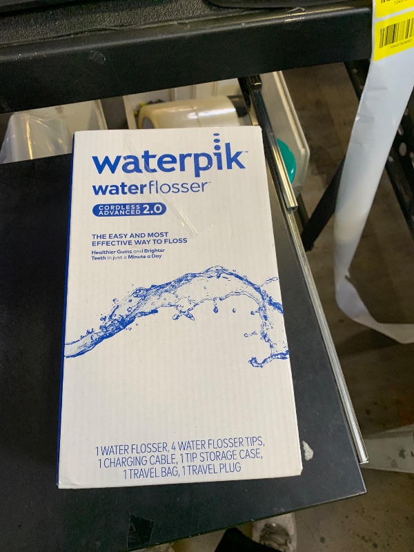 Photo 1 of Waterpik Cordless Advanced 2.0 Water Flosser For Teeth, Gums, Braces, Dental Care With Travel Bag and 4 Tips, ADA Accepted, Rechargeable, Portable, and Waterproof, White WP-580, Packaging May Vary