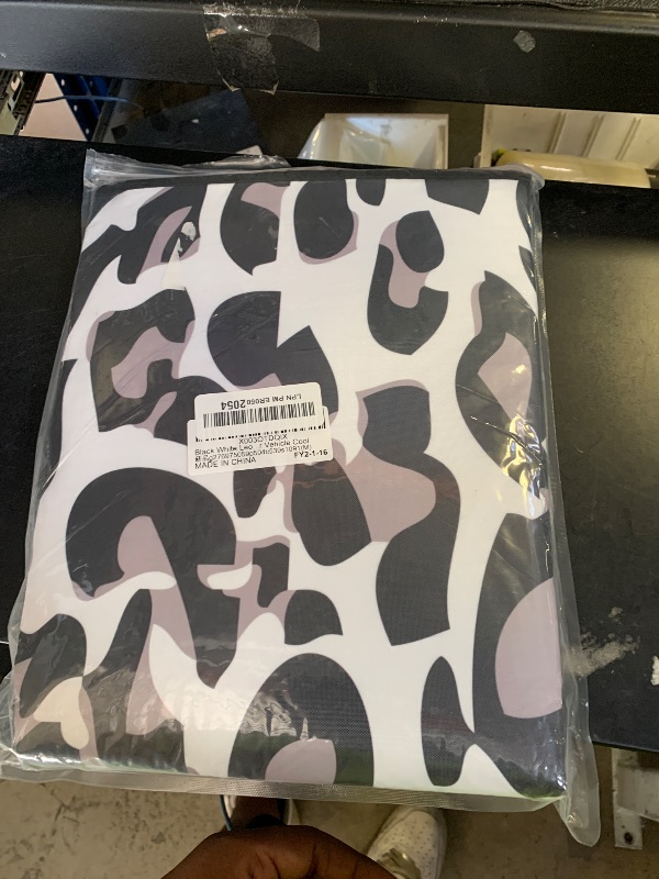 Photo 1 of Black White Leopard Windshield Sun Shade Blocks UV Rays Visor Protector Accordion Folding Sun Reflector Auto Sunshade for Car Truck SUV to Keep Your Vehicle Cool