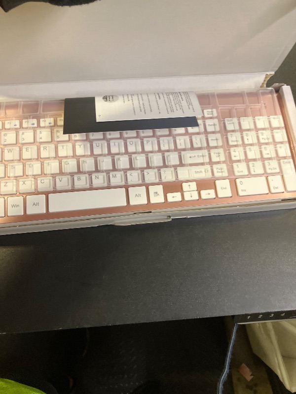 Photo 1 of Wireless Keyboard and Mouse Ultra Slim Combo, TopMate 2.4G Silent Compact USB 2400DPI Mouse and Scissor Switch Keyboard Set with Cover, 2 AA & 2 AAA Batteries,for PC/Laptop/Windows/Mac-Rose Gold White