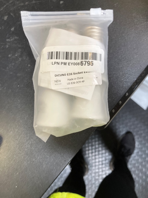 Photo 1 of DiCUNO E26 3CM/1.2 Inch Socket Extender, E26 Lamp Bulb Socket Extension, Lamp Holder Adapter, 4-Pack