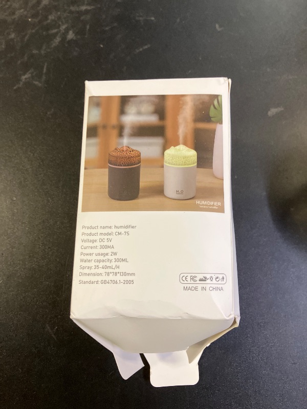 Photo 1 of Portable Mini Humidifier, Colorful Volcanic Texture, 300mL Cool Mist Humidifier, USB Powered, Auto Shut-Off. Perfect for Bedroom, Office & Car.