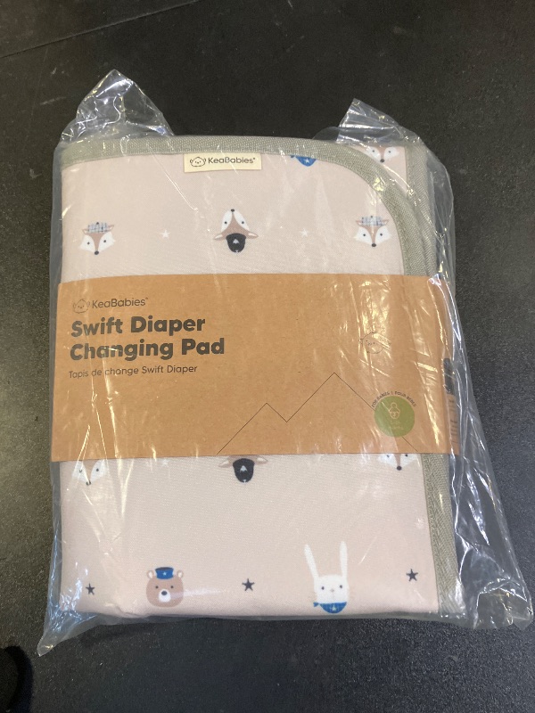 Photo 1 of KeaBabies Portable Diaper Changing Pad, Easy Wipe Clean - Foldable Waterproof Baby Changing Mat for Diaper Bag, Compact, Lightweight, 25x13 Newborn, Infant, Baby Changer Travel Essential (Wild Patrol)