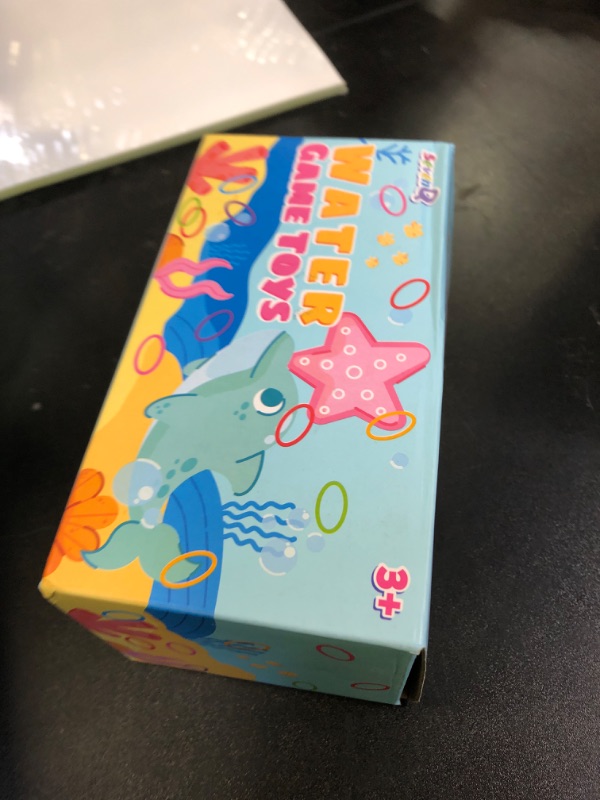 Photo 1 of SevenQ Handheld Water Games, 4 Packs Dinosaur Theme Water Toss Ring Game Aqua Toy Water Ring Game for Kids Stocking Stuffers