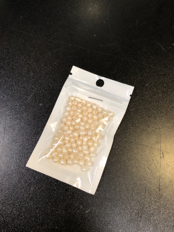 Photo 1 of FAKE PEARLS 