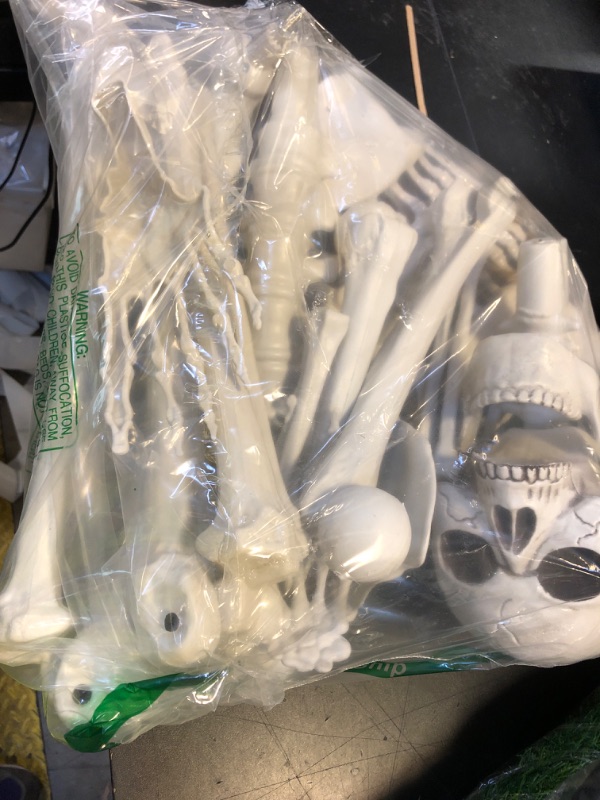 Photo 1 of Lodou 5.4Ft Posable Life Size Human Adult Skeletons Plastic Human Bones with Movable Joints for Halloween Decoration