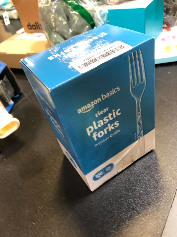 Photo 1 of Amazon Basics Disposable Clear Plastic Forks, Premium Quality, 100 Count, Large Pack