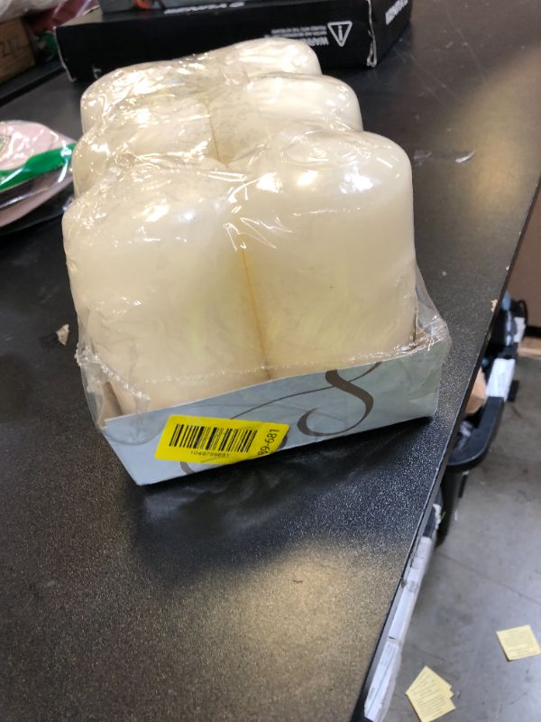 Photo 1 of Stonebriar 6 Pack Tall 3 x 6 Inch 65 Hour Long Burning Unscented Ivory Wax Pillar Candles