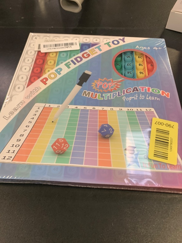 Photo 1 of Multiplication Chart Pop It - Multiplication Game Board, 12x12 Times Table Math Game Board for Kids Learning, Educational Multiplication Machine Toy