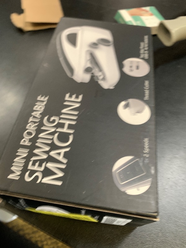 Photo 1 of Handheld Sewing Machine453