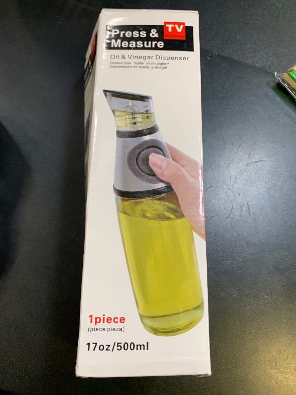 Photo 1 of PRESS AND MEASURE BOTTLE 
