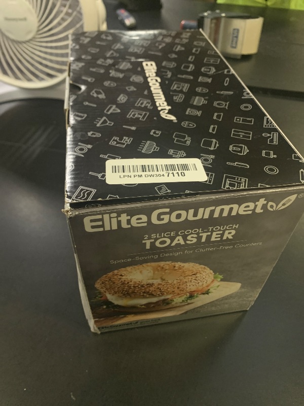 Photo 1 of Elite Gourmet ECT-1027 Cool Touch Toaster, 7 Toast Settings Cancel Functions, Slide Out Crumb Tray, Extra Wide 1.5" Slots for Bagels Waffles Specialty Breads, Puff Pastry, Snacks, White