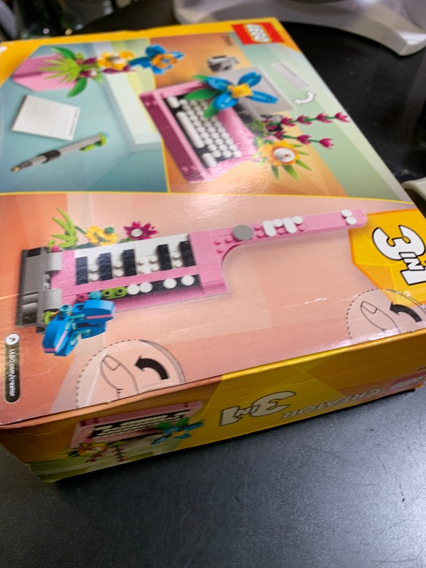 Photo 1 of LEGO Creator 3 in 1 Typewriter with Flowers - Birthday Gift for Kids - Building Toy with 3 Building Options, Typewriter, Flowerpot with Pen & Notebook, or Keytar - 31169