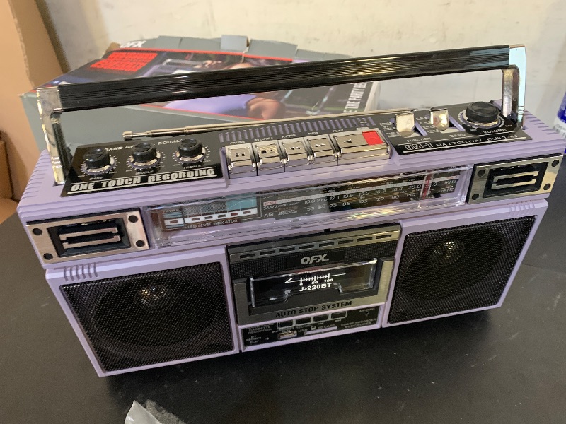 Photo 1 of QFX J-220BT Purple Boombox MP3 Conversion from Radio to Cassette with 4-Band (AM, FM, SW1, SW2) Radio with Bluetooth, Dual 3” Speakers, Built-in Microphone, Recorder, and a 3-Band Equalizer
