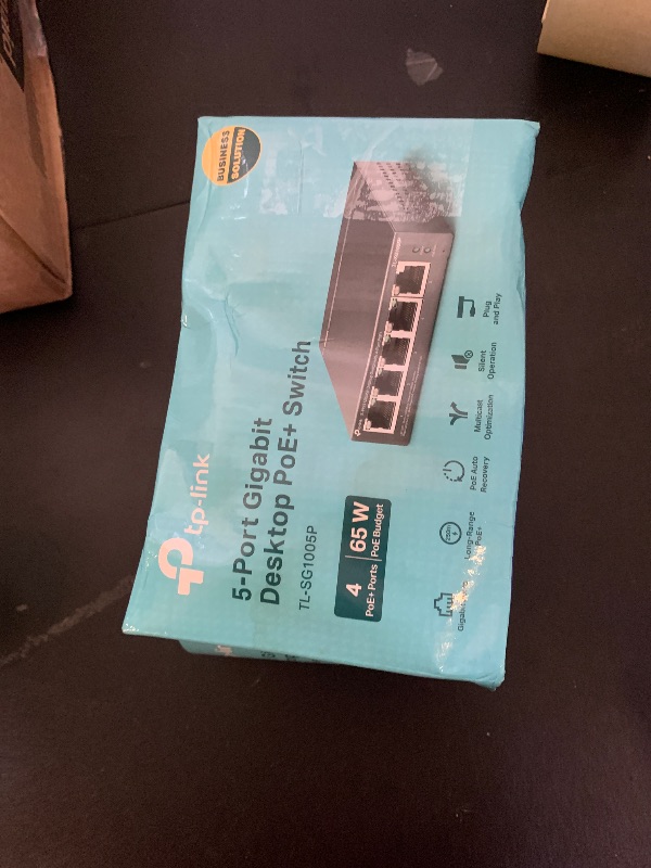 Photo 1 of TP-Link TL-SG1005P, 5 Port Gigabit PoE Switch, 4 PoE+ Ports @65W, Desktop, Plug & Play, Sturdy Metal w/ Shielded Ports, Fanless, QoS & IGMP Snooping