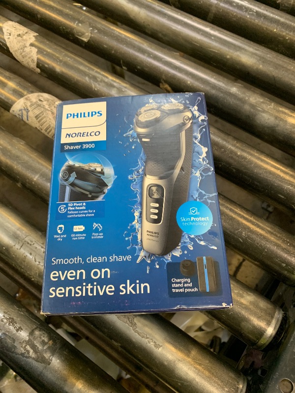 Photo 1 of Philips Norelco Shaver 3900 Series, Wet and Dry Electric Shaver, P-Cap, Travel Pouch, Charging Stand, Storm Blue, Model S3341/92