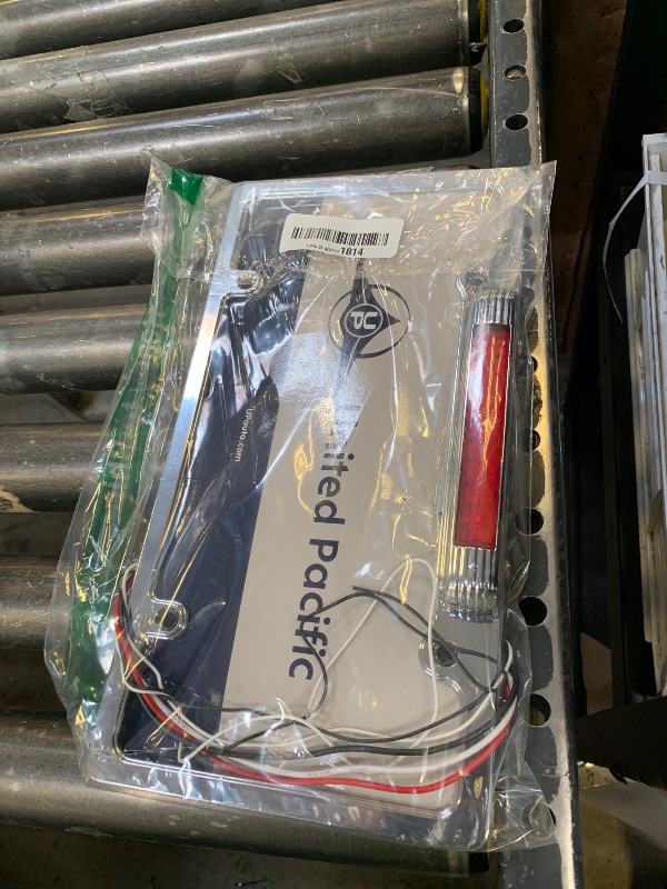 Photo 1 of United Pacific Chrome License Plate Frame with 3rd Brake Light - Red LED/Red Lens (50148)